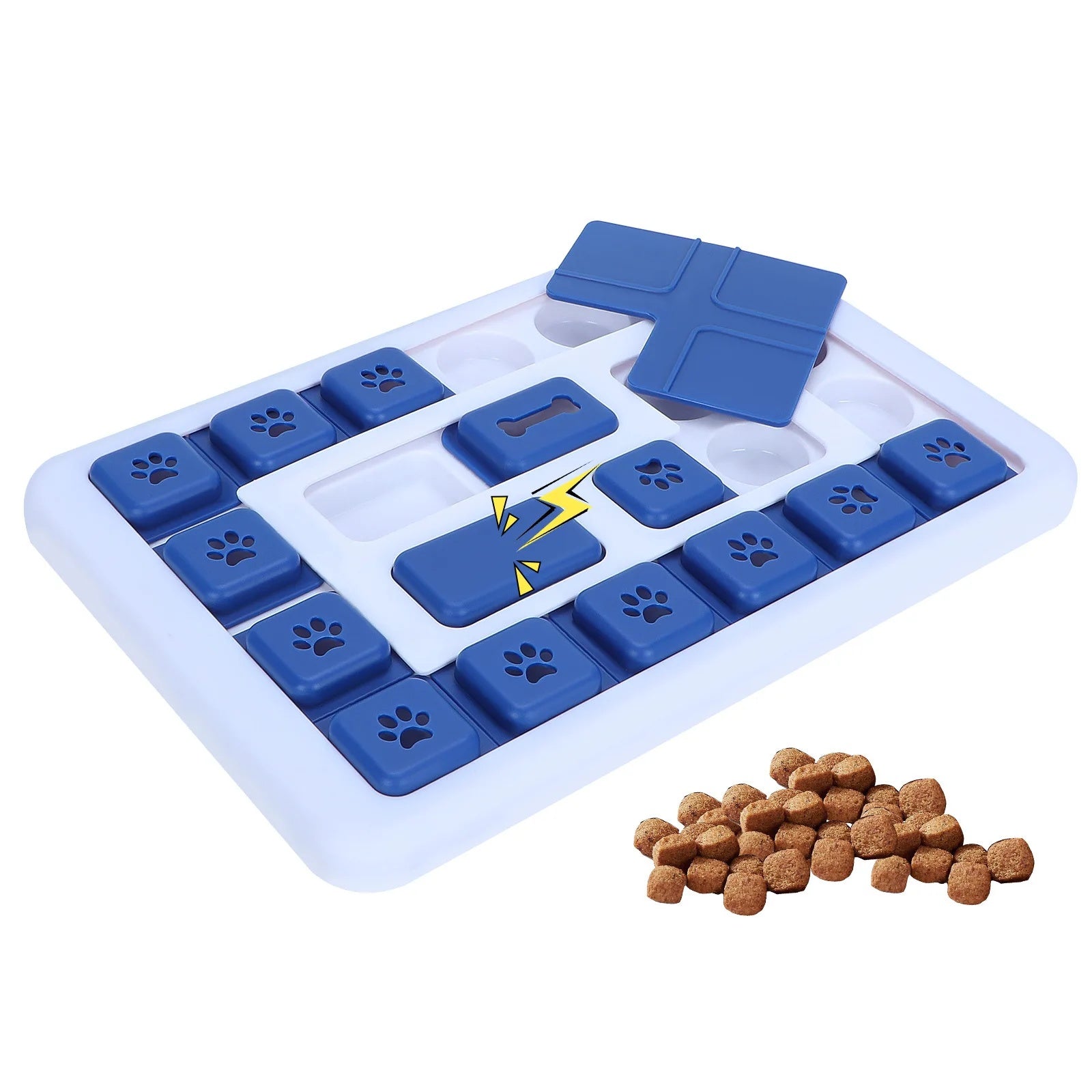 Blue and white dog puzzle toy slow feeder with sliding paw-print buttons and treats nearby.