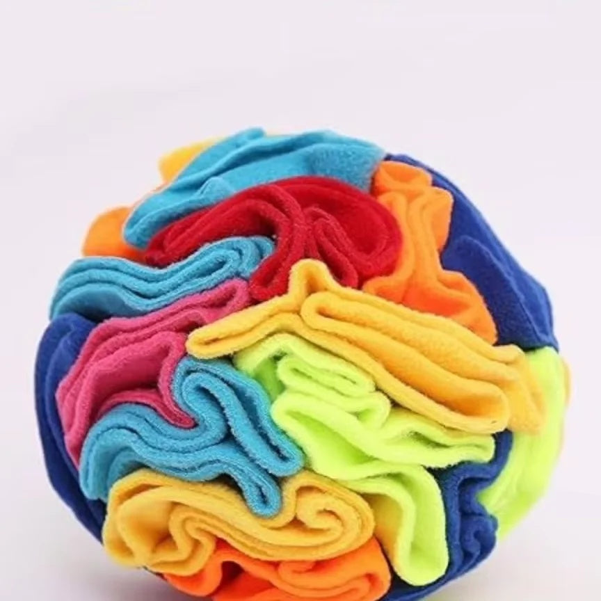 Close-up of the deep, non-toxic fleece folds of a colorful interactive dog snuffle ball