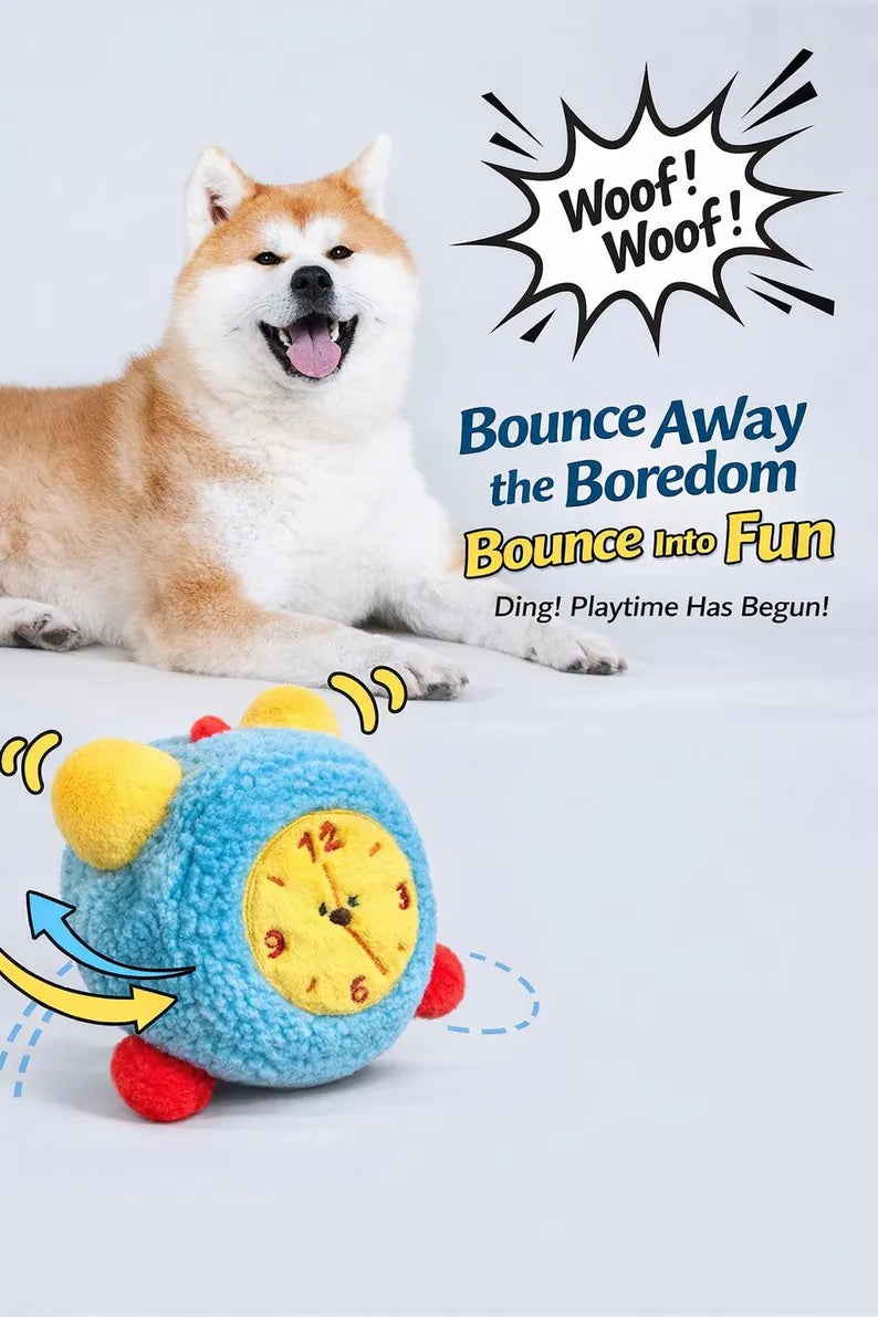 The dog plays with an automatic bouncing dog toy