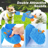 Interactive squeaky dog toy diagram showing built-in squeaker in the body and crinkle paper in the wings. Small dogs playing tug of war with the noisy blue goose plush.