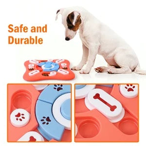 A Corgi using its nose to push the paw-print slider on the purple interactive dog treat dispenser toy.